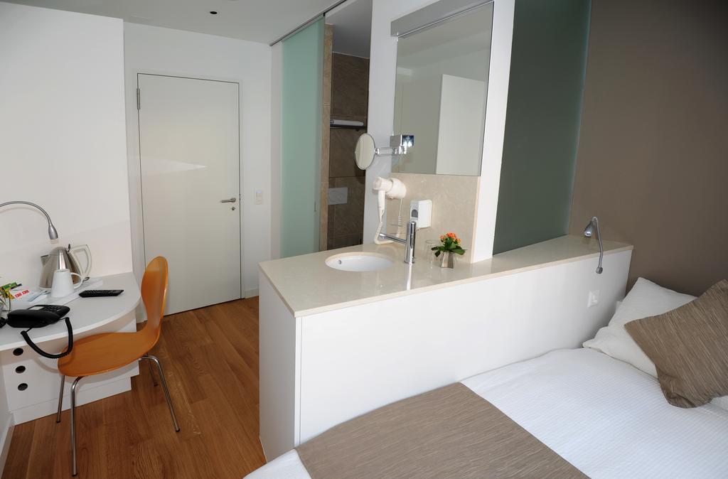 Hotel Elite Sion Pokoj fotografie
