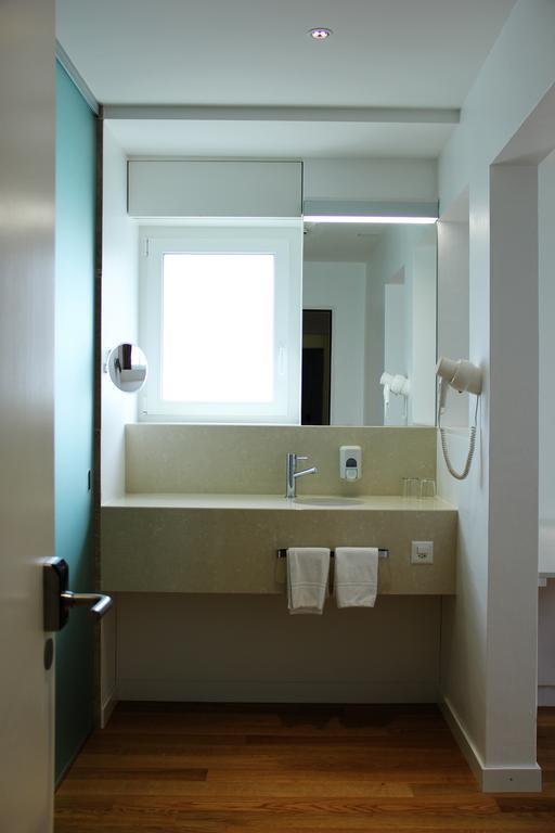 Hotel Elite Sion Pokoj fotografie